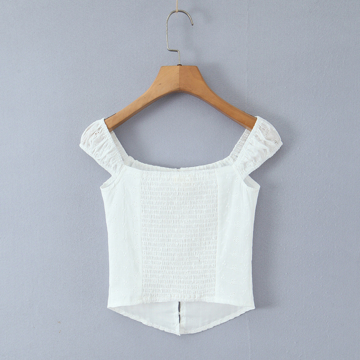 Embroidered pleated single breasted top with floral embroidery