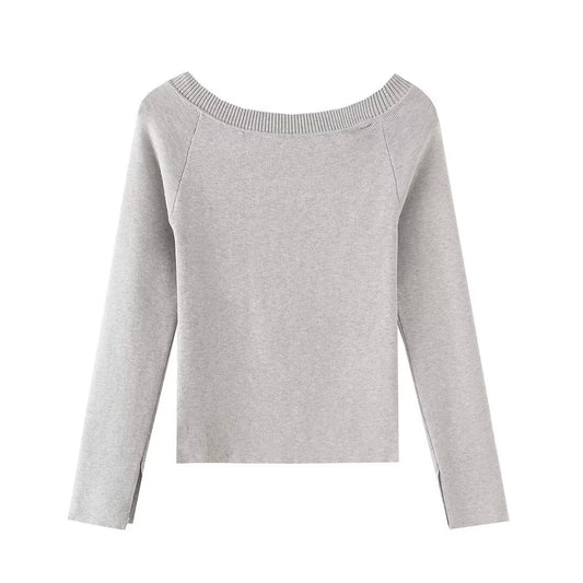 Slanted shoulder open shoulder long sleeved top