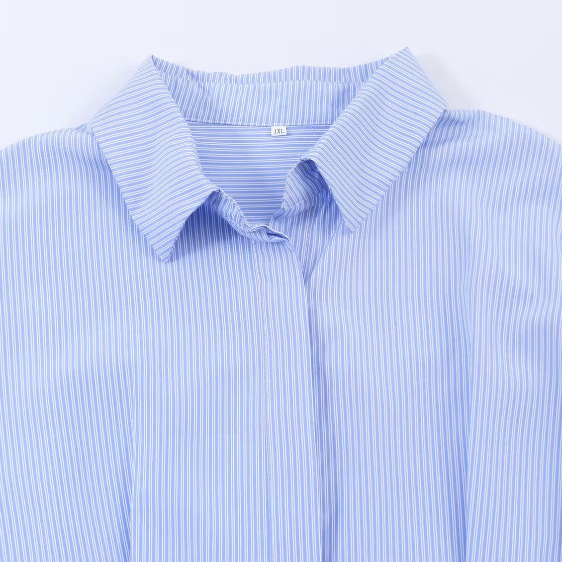 French design commuting waist cinching striped shirt