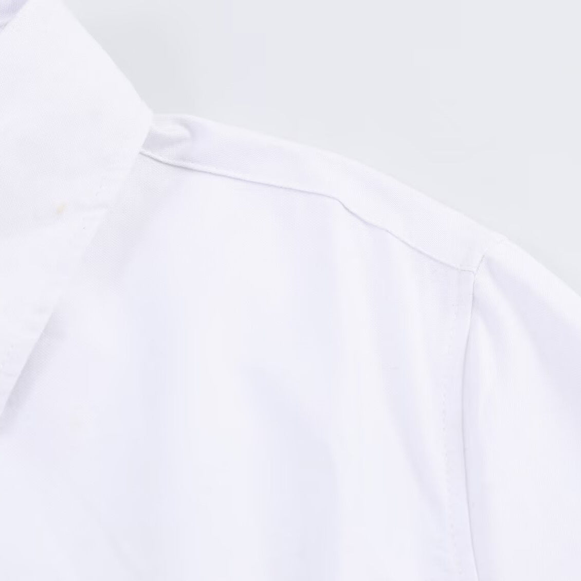 Simple all cotton Oxford long sleeved waist cinched collared shirt